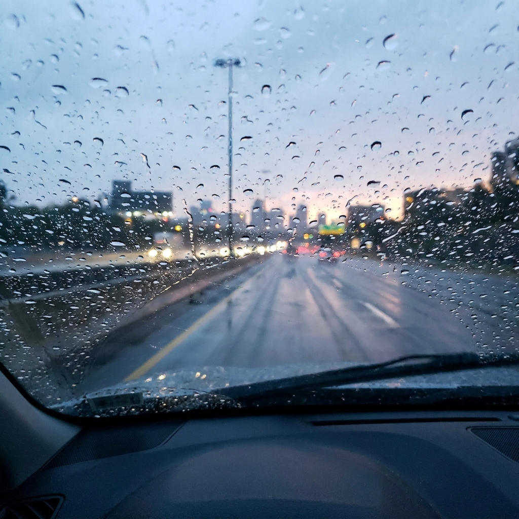 Windshield blurred by rain before ClearView