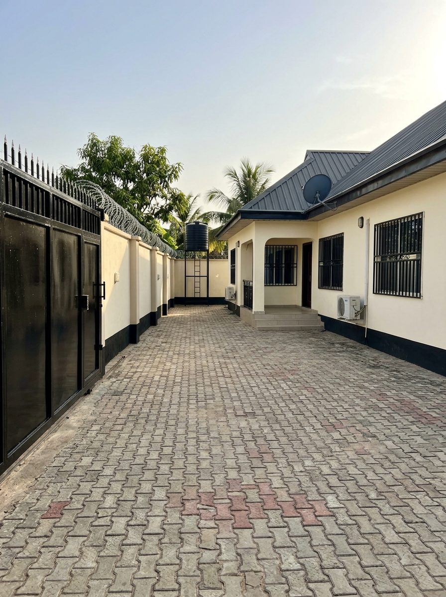 Clean compound with a freshly sprayed gloss black gate and window burglary proof